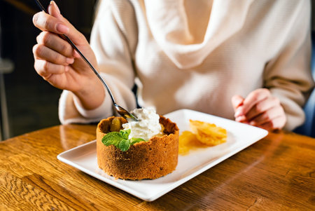 woman eating dessert with pineapple