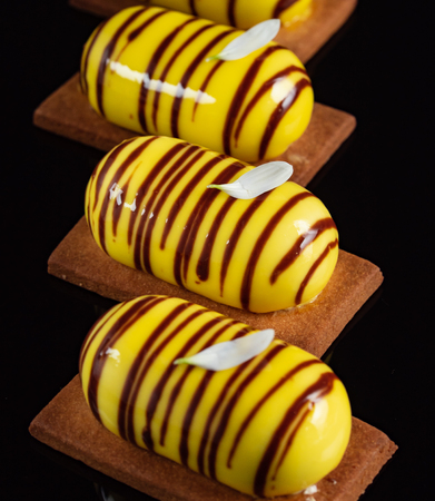 lemon pastries with flower petalsの写真素材
