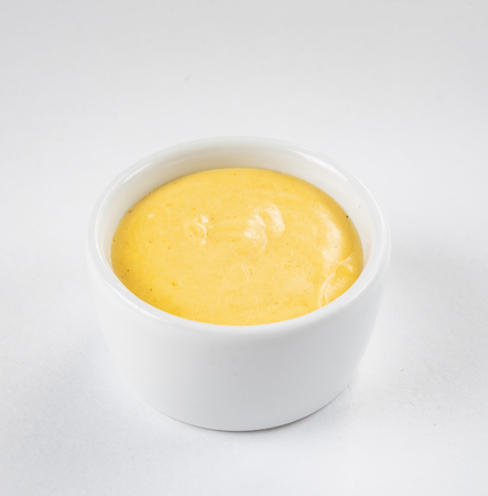 mustard sauce in the bowlの写真素材