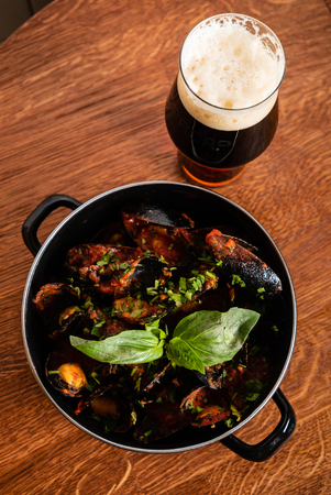 Steamed mussels in white wine sauceの写真素材