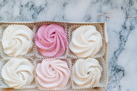 Beautiful delicious dessert. Zephyr in the shape of flowers roses.