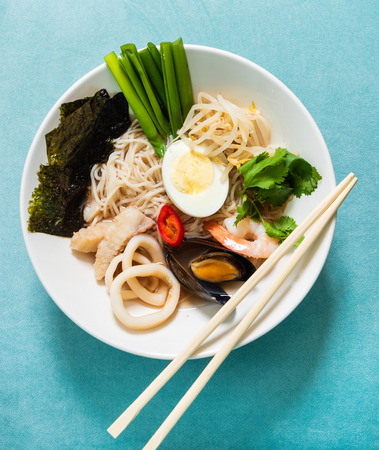 noodle with mussels, shrimps and seaweedの写真素材