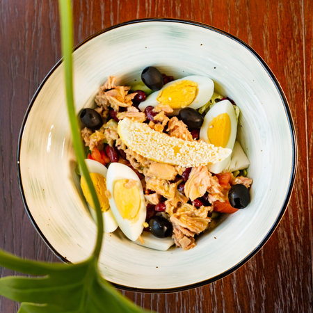 tuna salad with egg and olivesの写真素材