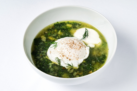 spring soup with nettle and eggの写真素材
