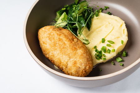 cutlet with mashed potato and saladの写真素材