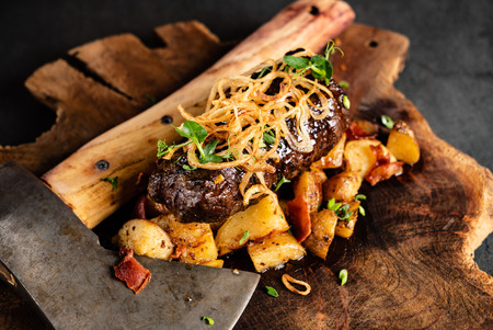 steak wit baked potatoesの写真素材
