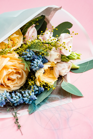 Beautiful colorful flower bouquet on the pinkの写真素材