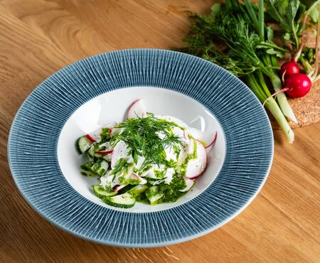 summer fresh salad with radishesa and cucumberの写真素材