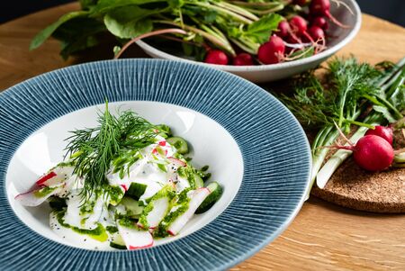 summer fresh salad with radishesa and cucumberの写真素材