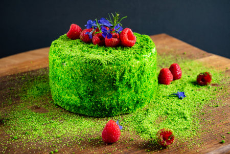 spinach cake with fresh raspberriesの写真素材