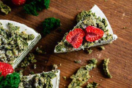 spinach cake with fresh raspberriesの写真素材