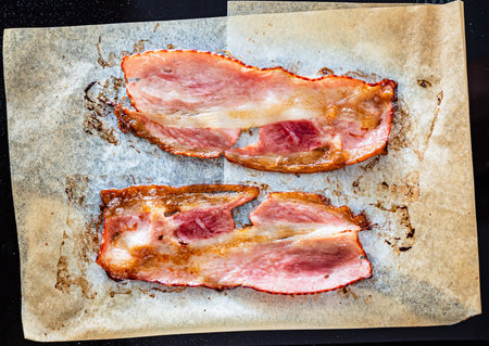 Fried bacon on the parchment