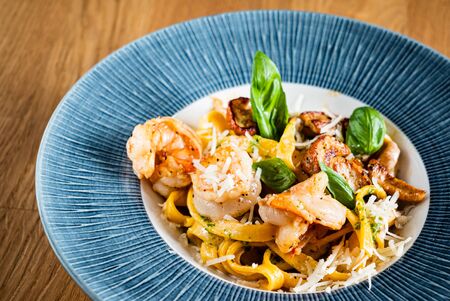 pasta with shrimps and boletusの写真素材