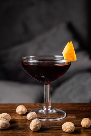 cocktail with nutmeg on the wooden tableの写真素材