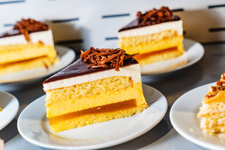mango cake with chocolate and jam