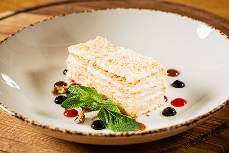 napoleon cake with berry sauceの写真素材