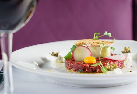 beef tartar with eggの写真素材