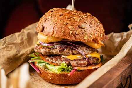 Burger with beef cutlet and vegetablesの写真素材