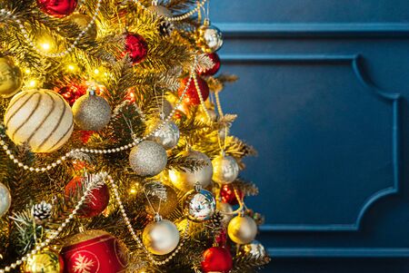 Christmas tree with red and golden ballsの写真素材