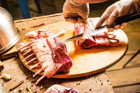 Chef preparing mutton ribs for bbq
