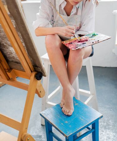 Painter in her studioの写真素材