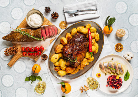 New Year table with different dishes and drinks