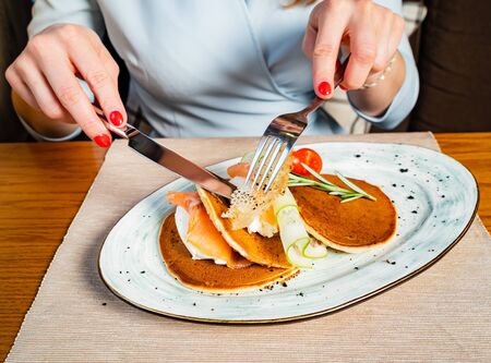 pancakes with cream cheese and salmonの写真素材