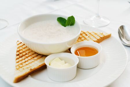 porridge with butter and honeyの写真素材