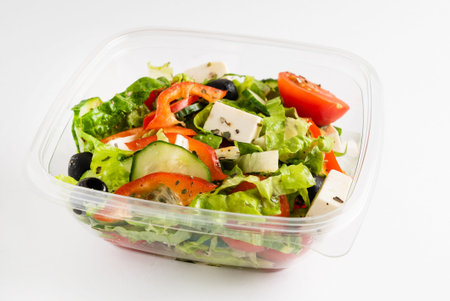 greek salad in the plastic boxの写真素材