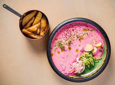 cold beetroot soup with baked potatoの写真素材