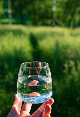 glass of clean water outdoorの写真素材