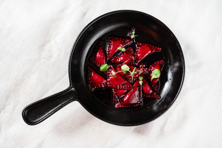 beetroot ravioli with soft cheese, top view