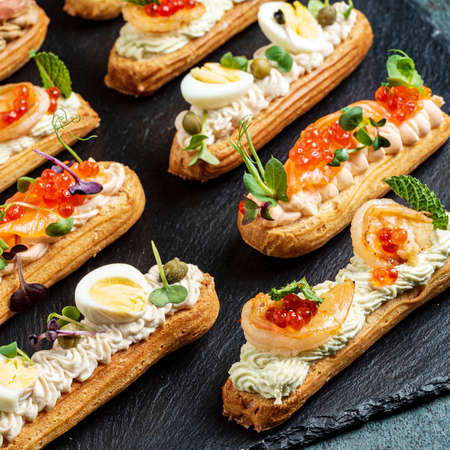 Christmas appetizers on the stone boardの写真素材