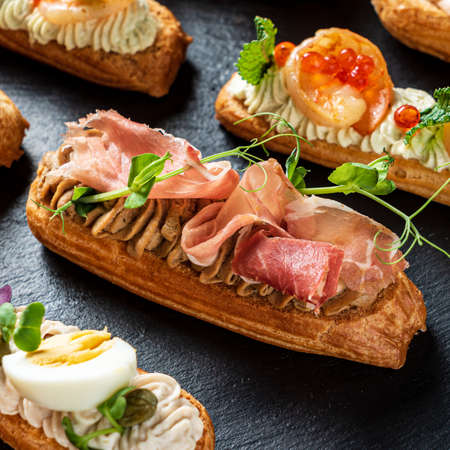 Christmas appetizers on the stone boardの写真素材