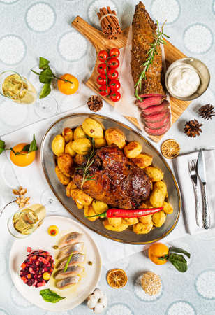 New Year table with different dishes and drinksの写真素材