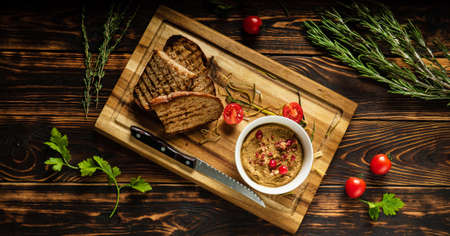 Fresh homemade chicken liver pate and rye breadの写真素材