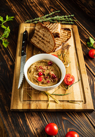 Fresh homemade chicken liver pate and rye breadの写真素材