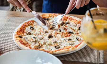 pizza in the italian restaurantの写真素材