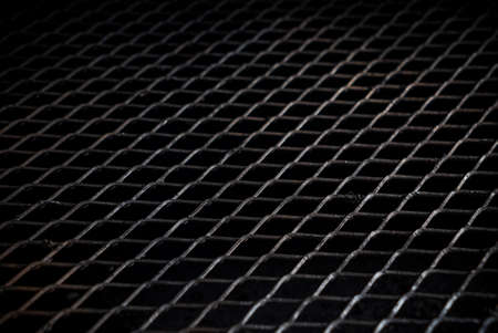 black metal grill background closeupの写真素材