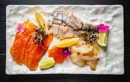 fish plate with lemon and caviarの写真素材