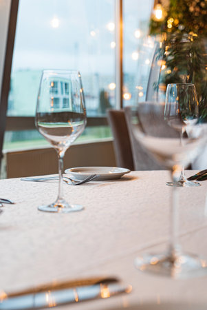 Served dinner table in a restaurant. Restaurant interiorの写真素材