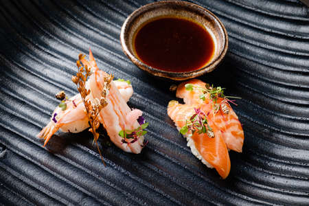 nigiri with shrimps and soy sauceの写真素材