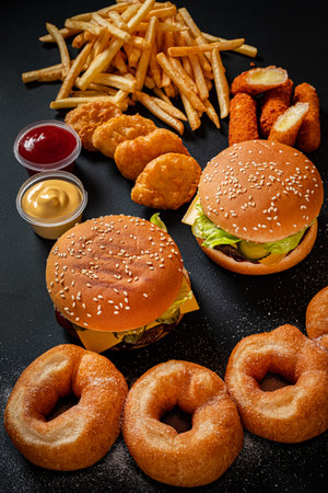 fast food on the black background