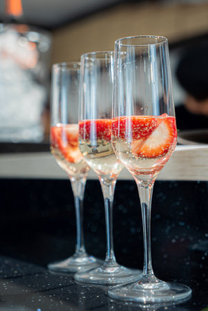 catering table with fizz and strawberriesの写真素材