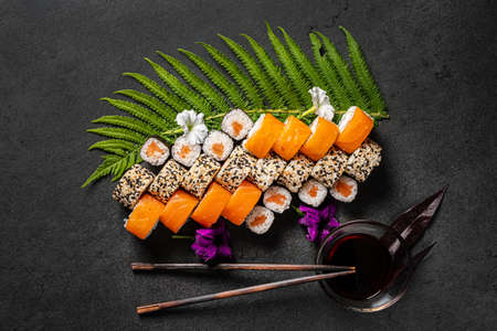 exotic sushi set on the black plateの写真素材