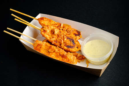 chicken kebab with sauce in the boxの写真素材