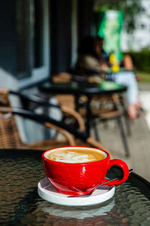 cup of cuppuccino in the red cupの写真素材