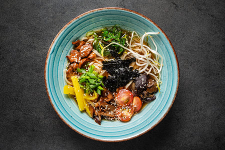 asian noodle soup on the black backgrouond