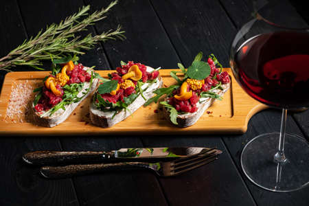 canape on the dark Christmas tableの写真素材