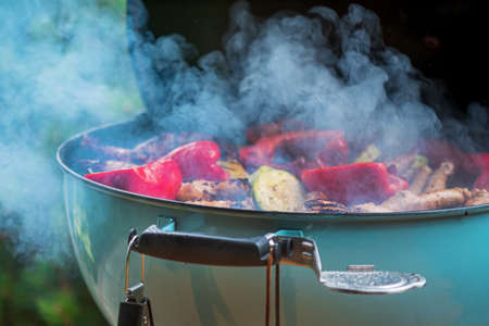 grilled vegetables and pork sausagesの写真素材